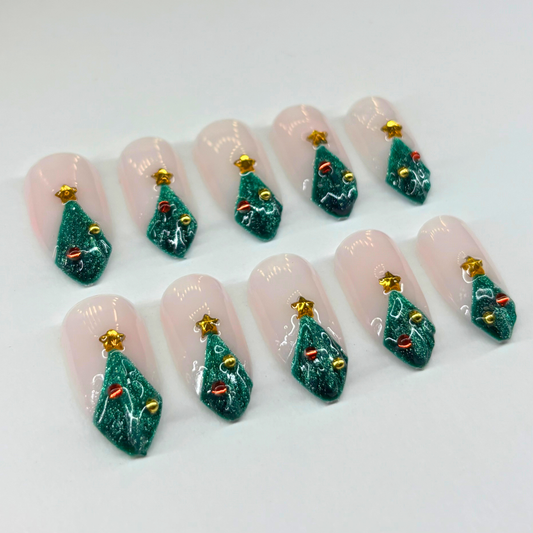 Christmas Tree Press-On Nail Set – Nude Base with Green Glitter Trees, Gold Star Charms & Ornaments