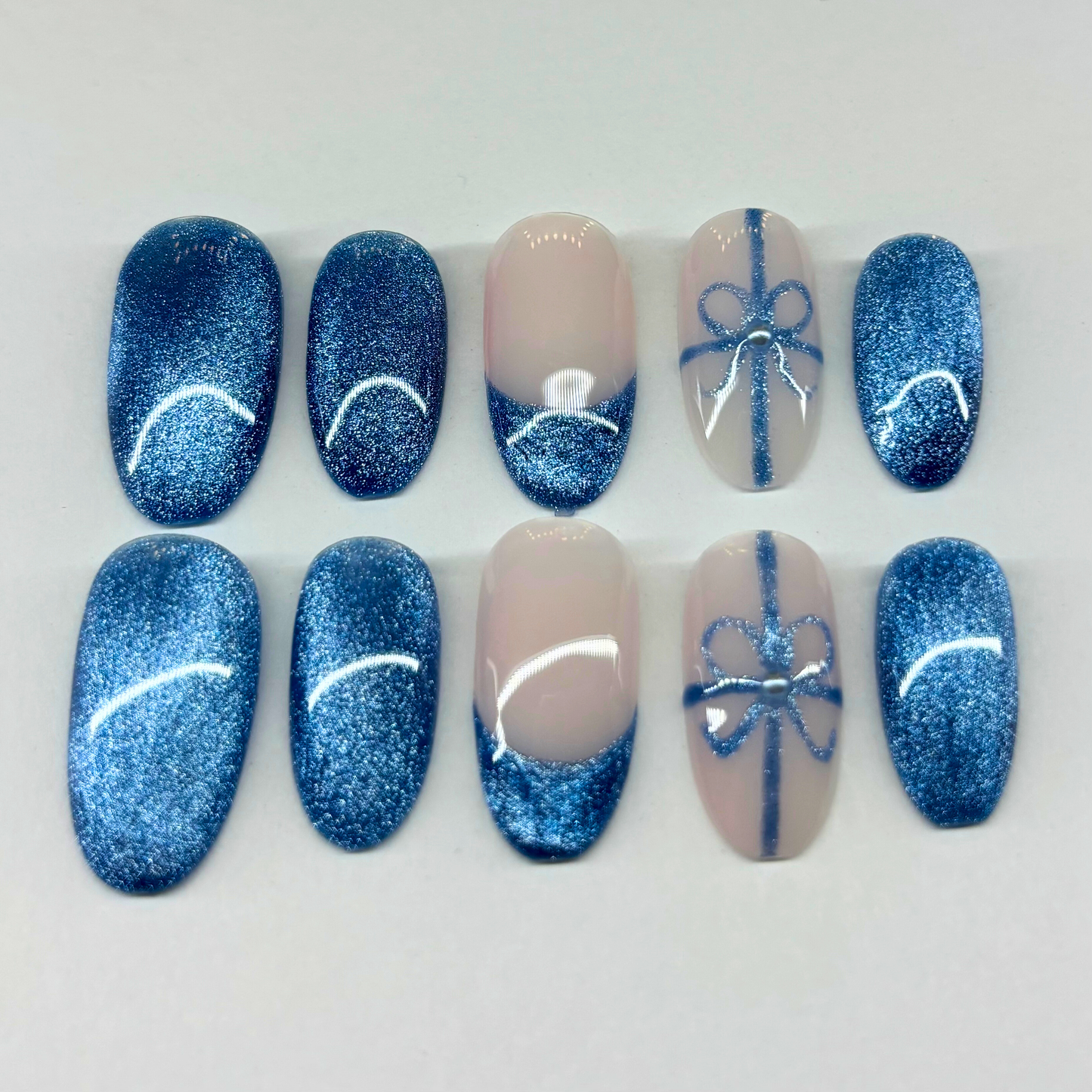 Blue Gift Wrap Press-On Nail Set – Sparkle Blue Nails with Nude French Tips & Bow Accent Art