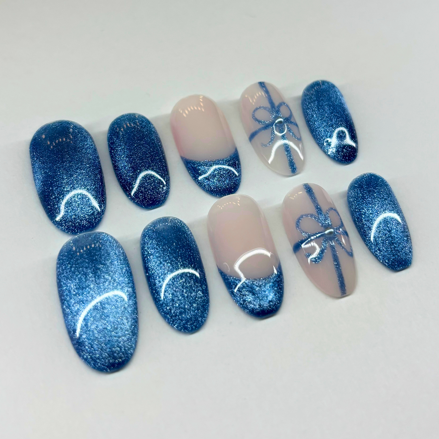 Blue Gift Wrap Press-On Nail Set – Sparkle Blue Nails with Nude French Tips & Bow Accent Art