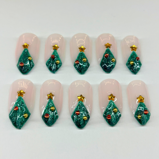 Christmas Tree Press-On Nail Set – Nude Base with Green Glitter Trees, Gold Star Charms & Ornaments